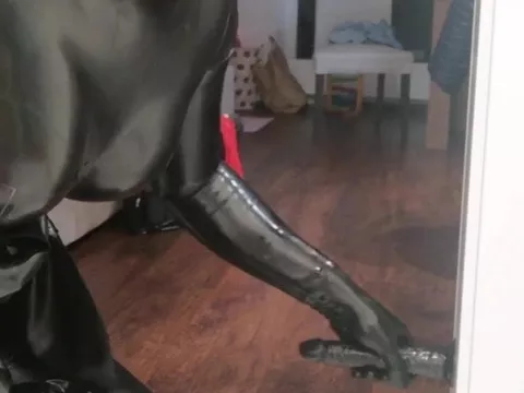 Rubber latex sissy in gasmask plays in all directions dildo